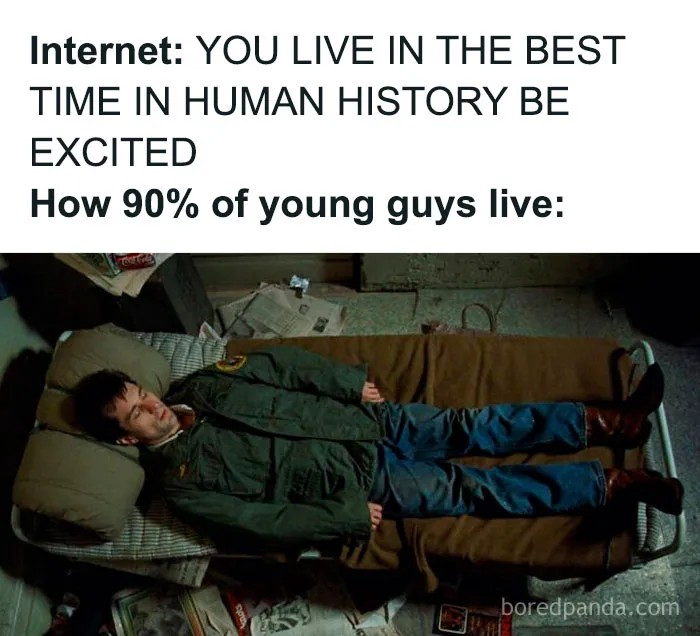Young man lying on a bed in a cluttered room, illustrating a random Gen-Z meme about modern life perception.