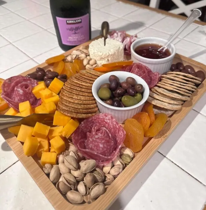 Your Meticulously Arranged Charcuterie Masterpiece Can Now Travel To The Picnic Spot Looking As Instagrammable As When It Left Your Kitchen, All Thanks To <a Style="Display:inline;" Href="Https://Www.amazon.com/Farberware-Cutting-Compartments-Charcuterie-More-Make/Dp/B0ckbyp86c?ie=utf8&th=1&linkcode=ll1&tag=bpraccoon-20&linkid=bee12b7fbb788b9f37515c673b25cce4&language=en_us&ref_=as_li_ss_tl" Target="_blank"><span Style="Font: Inherit; Color: #d74b1f;"> This Charcuterie Board That Comes With Its Own Protective Plastic Lid</Span>