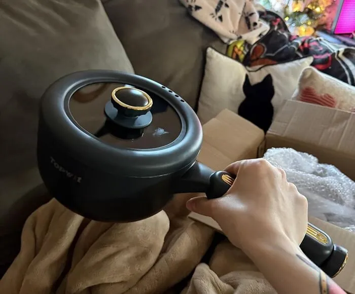 The Ability To Whip Up A Personal Hot Pot Literally Anywhere, From Your Desk To A Remote Mountain Top (Probably), Is A Terribly Specific Power Granted By <a Style="Display:inline;" Href="Https://Www.amazon.com/Electric-Non-Stick-Portable-Silicone-Included/Dp/B0dhgj5r8n?ie=utf8&th=1&linkcode=ll1&tag=bppony-20&linkid=bda470ba194f168518ddf10488a3d4fd&language=en_us&ref_=as_li_ss_tl" Target="_blank"><span Style="Font: Inherit; Color: #d74b1f;"> This Portable Electric Hot Pot</Span>, And We're Here For That Level Of Chaos