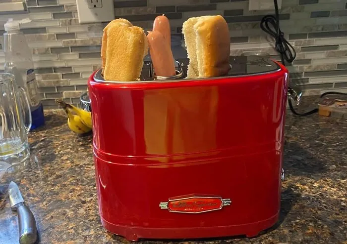 Embrace The Beautiful Absurdity Of Appliance Specialization With <a Style="Display:inline;" Href="Https://Www.amazon.com/Nostalgia-Hdt600retrored-Pop-Up-Toaster-Retro/Dp/B005q8x6io?ie=utf8&th=1&linkcode=ll1&tag=bppony-20&linkid=1dbc37e0f13ff2f41d45707ac2ca5dc7&language=en_us&ref_=as_li_ss_tl" Target="_blank"><span Style="Font: Inherit; Color: #d74b1f;"> This Hot Dog Toaster</Span> That Crisps Your Buns And Heats Your Wieners With The Kind Of Terrible, Single-Minded Focus We Can't Help But Admire