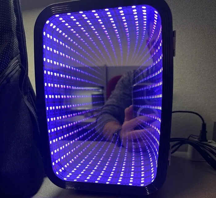 Your Desire For A Beverage That Looks Like It's Emerging From The Upside Down Will Finally Be Sated By <a Style="Display:inline;" Href="Https://Www.amazon.com/Fansexpert-Refrigerator-Dimmable-Portable-Bedroom/Dp/B0dppgdnrt?ie=utf8&th=1&linkcode=ll1&tag=bppony-20&linkid=d840e9247032b8099c302f5edf9b4c1e&language=en_us&ref_=as_li_ss_tl" Target="_blank"><span Style="Font: Inherit; Color: #d74b1f;"> This Probably-Not-Energy-Efficient Mini Fridge With Intense LED Portal Lights</Span>, Practicality Be Damned