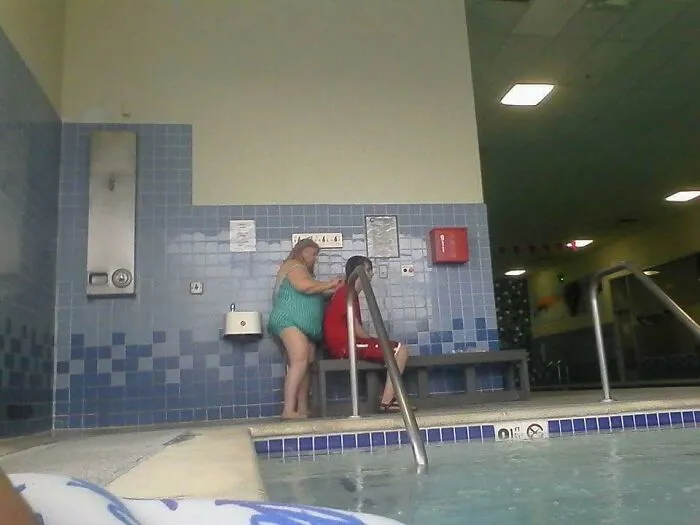 She's Cutting His Hair... At The The Gym Pool