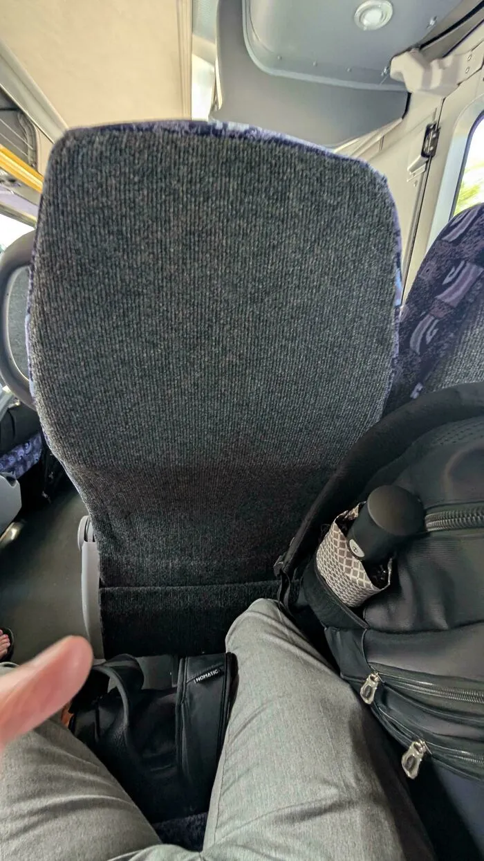 The Lady Next To Me Leans Her Bag On Me After I Ask Her To Move It To Take The Last Available Seat