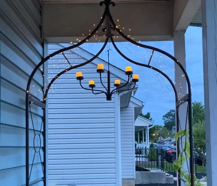 If Your Idea Of Garden Party Lighting Leans Less 'Twinkly Fairy Lights' And More 'Epic Rock Opera Candelabra,' Then This <a Style="Display:inline;" Href="Https://Www.amazon.com/Smtyle-Hanging-Chandelier-Tealight-Outdoor/Dp/B07mtc3vxs?ie=utf8&linkcode=ll1&tag=bpsheep-20&linkid=80cbcc983332bcebafdbe830e9064729&language=en_us&ref_=as_li_ss_tl" Target="_blank"><span Style="Font: Inherit; Color: #d74b1f;"> Metal Candle Chandelier</Span> Is Basically Your Backyard's New Headliner