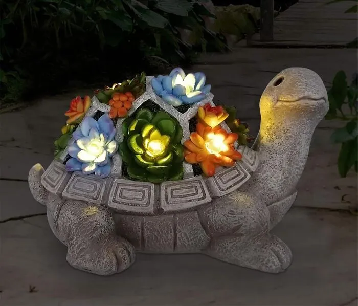 Meet The Chillest Dude On The Block, This <a Style="Display:inline;" Href="Https://Www.amazon.com/Nacome-Garden-Statue-Figurine-Succulent/Dp/B091zfl4x5?crid=2f7ppw9alfiy4&dib=eyj2ijoimsj9.azo4754og3rfap8smjas7r-Knxmqzhcnjw7behqdskykhdpble8vzpzhqdav3qglsbjevprkoj_apw_hefxovus7vkz2wurlkza0zabdxa9zt8tzzn5whjeamei9xenp7kb8xxlzjhuyofb5ou4tv9l8wmzglmzylytsplhlo0q2c3wiqf3qgkq17cer0nubvzo0nekysjvqur61gft-Hfrjitpraih99dsbcmug3qgkpf7vw_nsg3i4xx7qqijymvzj-Lrd_ifvcgucbcz0vtrfhrecsxdhjfvvcgibxog.nqzi4rngbbbrliax_mxqesjax297lagbt-Khindsqig&dib_tag=se&keywords=fun%2bgarden%2blights&qid=1749113690&sprefix=fun%2bgarden%2blights%2caps%2c203&sr=8-28&th=1&linkcode=ll1&tag=bpsheep-20&linkid=28f01d66ddaf095550640bb5ee7b9005&language=en_us&ref_=as_li_ss_tl" Target="_blank"><span Style="Font: Inherit; Color: #d74b1f;"> Solar Turtle Statue</Span> That's Here To Light Up Your Life (And Your Flowerbeds) With Its Fabulous Floral Shell Display