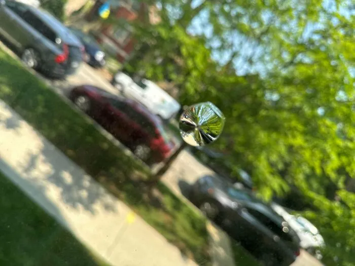Lens Or Defect In The Middle Of My Front Window?