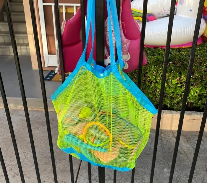 Prevent The Entire Beach From Trying To Hitch A Ride Home With You By Using This Genius <a Style="Display:inline;" Href="Https://Www.amazon.com/Supmlc-Backpack-Holding-Children-Grocery/Dp/B07phcwj9w?ie=utf8&linkcode=ll1&tag=bpowl-20&linkid=b382bd2cc4a446593cd7814249301450&language=en_us&ref_=as_li_ss_tl" Target="_blank"><span Style="Font: Inherit; Color: #d74b1f;"> Mesh Beach Bag</Span> That’s Basically A Bouncer For Unwanted Sand