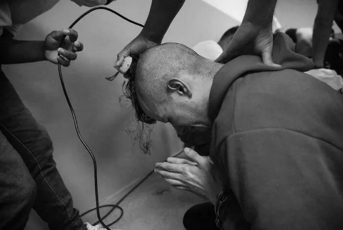 Andry Romero, A Gay Makeup Artist Sent To El Salvador, Sobbing And Praying As Guards Shave His Head