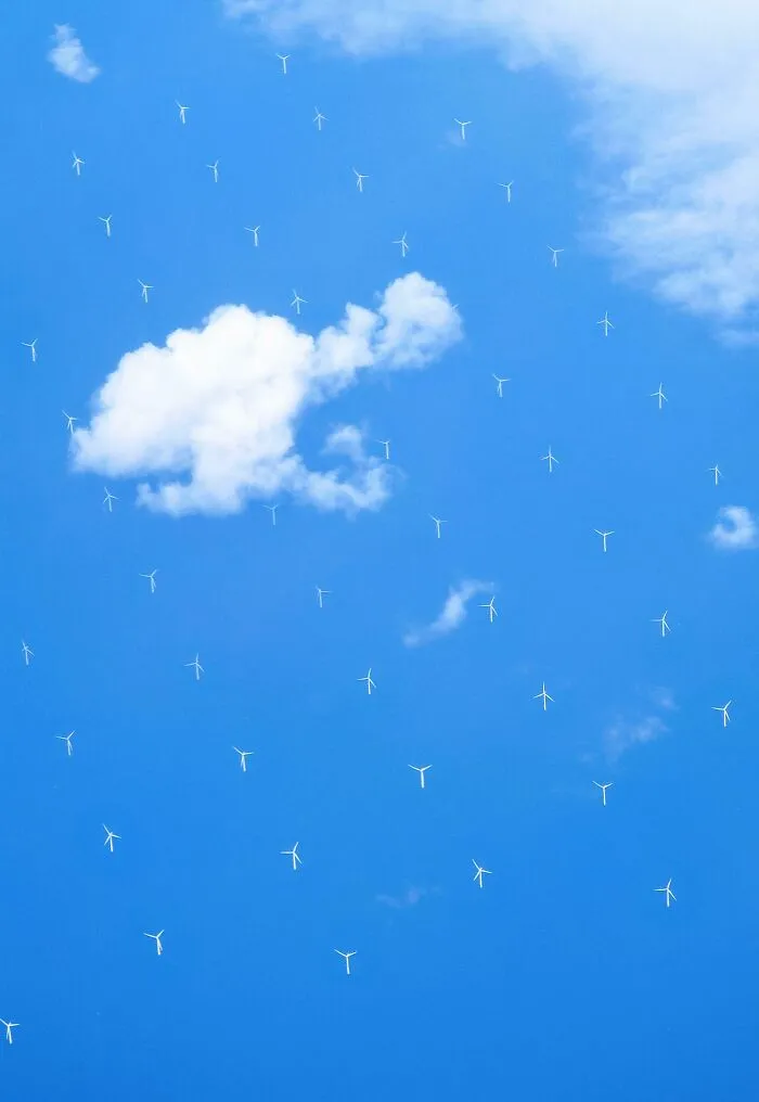 These Wind Turbines From My Plane Look Like They're Floating In The Sky
