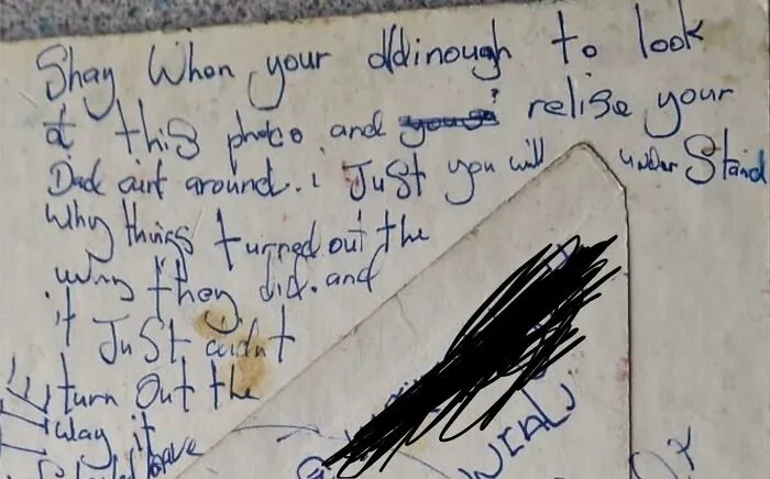 Handwritten historical memento note found randomly, showing personal thoughts and worn paper texture.