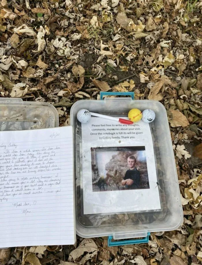 Clear plastic container with written memories and golf balls serving as historical mementos found outdoors among dry leaves.