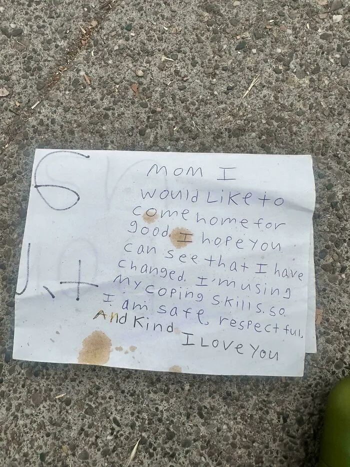 Handwritten letter found on pavement as a historical memento expressing hope, change, and love.