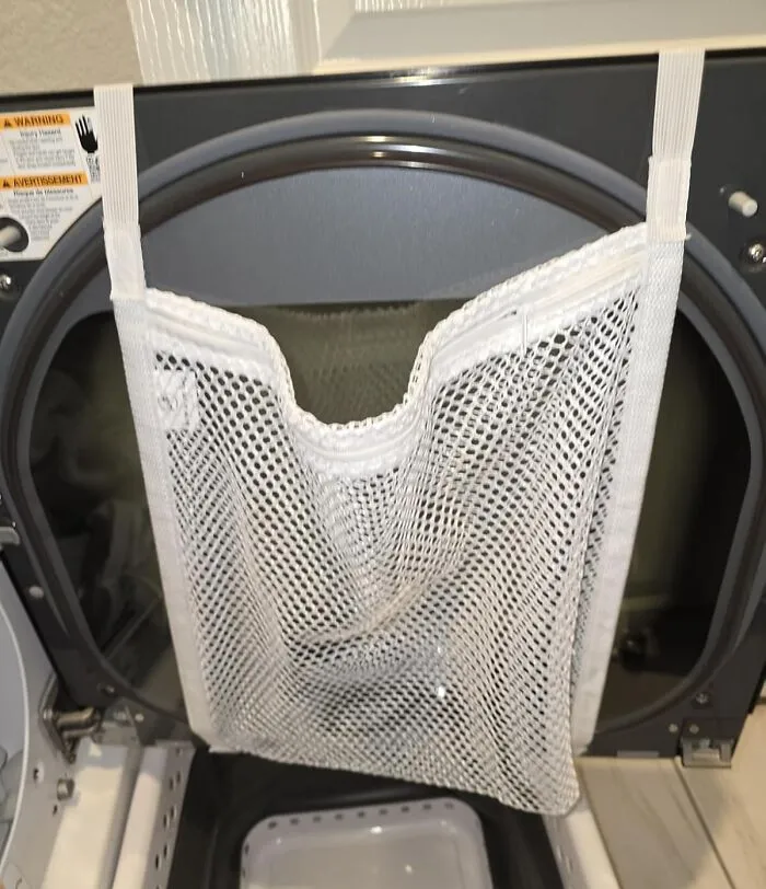 Stop Your Sneakers From Auditioning For Stomp Inside Your Dryer With This Clever<a Style="Display:inline;" Href="Https://Www.amazon.com/Inc-Sneaker-Elastic-Straps-Laundry/Dp/B0bq4ncymx?ie=utf8&linkcode=ll1&tag=bpbird-20&linkid=725f9869549274aea4a7d98edcd684e5&language=en_us&ref_=as_li_ss_tl" Target="_blank"> <span Style="Font: Inherit; Color: #d74b1f;"> Sneaker Dryer Bag </Span> That Just Chills On The Door