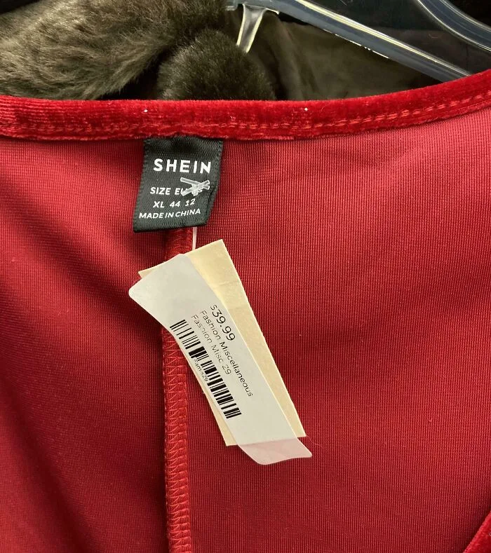 Red velvet garment with a SHEIN label and a $39.99 thrift store price tag, showcasing ridiculous thrift store finds.