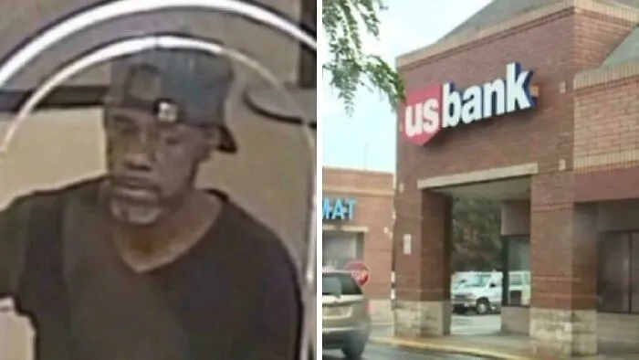 Man wearing a backward cap in a security camera image next to a US Bank building outside in daylight, fascinating content topic.