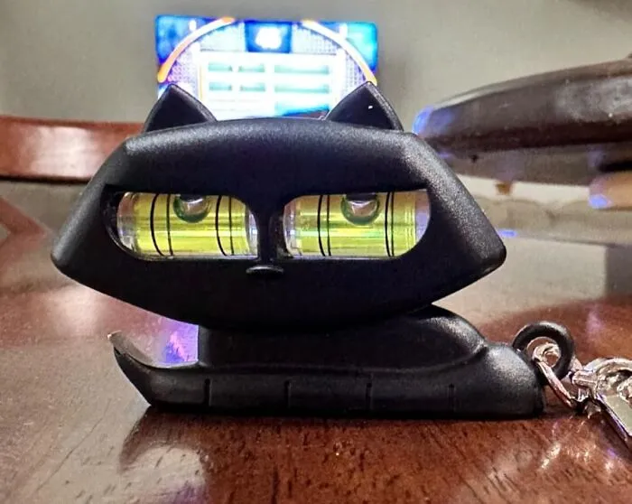 Turns Out This <a Style="Display:inline;" Href="Https://Www.amazon.com/Monkey-Business-Bottle-Keychain-Keyring/Dp/B0cqc4j46w?ie=utf8&linkcode=ll1&tag=bpbutterfly-20&linkid=0a26b68134da79b70d73214a5f454328&language=en_us&ref_=as_li_ss_tl" Target="_blank"><span Style="Font:inherit; Color: #d74b1f;"> Quirky Kitty Keychain </Span> Has Been Moonlighting As A Bartender And A Carpenter, Who Knew