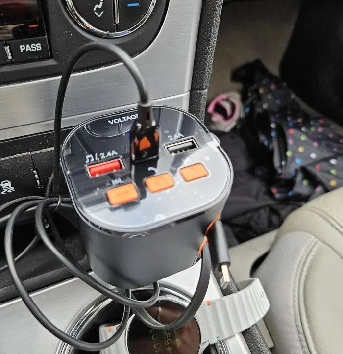 For Those Road Trips Where Everyone's Phone Is Simultaneously Dying And Threatening To Ignite A Full-Blown Existential Crisis, This <a Style="Display:inline;" Href="Https://Www.amazon.com/Retractable-Bluetooth-Transmitter-Handsfree-Chargers/Dp/B0dn17m5n9?ie=utf8&th=1&linkcode=ll1&tag=bptapir-20&linkid=9bfbe7b21a899e3418565ba1b1e7c1fd&language=en_us&ref_=as_li_ss_tl" Target="_blank"><span Style="Font: Inherit; Color: #d74b1f;"> 5-In-1 Car Charger</Span> Is Basically Your Car's Designated Peacekeeper And Power Provider