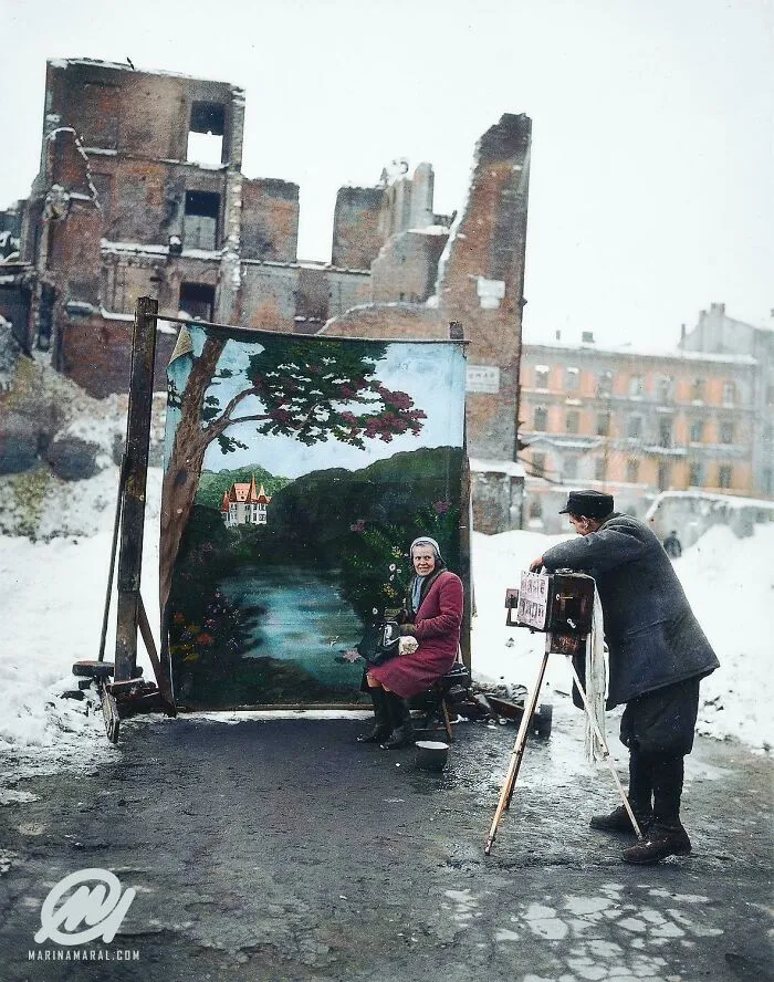A Photographer Uses His Own Backdrop To Mask Poland's World War II Ruins While Shooting A Portrait In Warsaw, November 1946