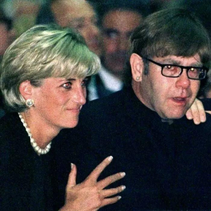 Two people in a dim setting, engaged in conversation, representing fascinating content on the internet facts.