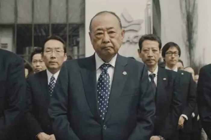 Group of serious men in suits standing outdoors, representing fascinating content on the internet facts and information.