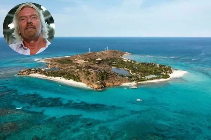 Aerial view of a tropical island surrounded by clear blue ocean water showcasing fascinating content on the internet.