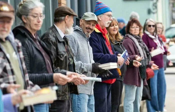 In Just Two Hours, 300 Chelsea, Michigan, Residents Formed A Human Chain To Move 9,000 Books A Block Away, Shelving Them Alphabetically At A New Bookstore Location