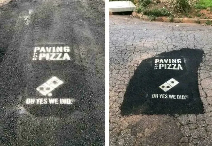 Street pavement art with paving and pizza text and Domino's logo, showcasing fascinating and interesting facts on the internet.