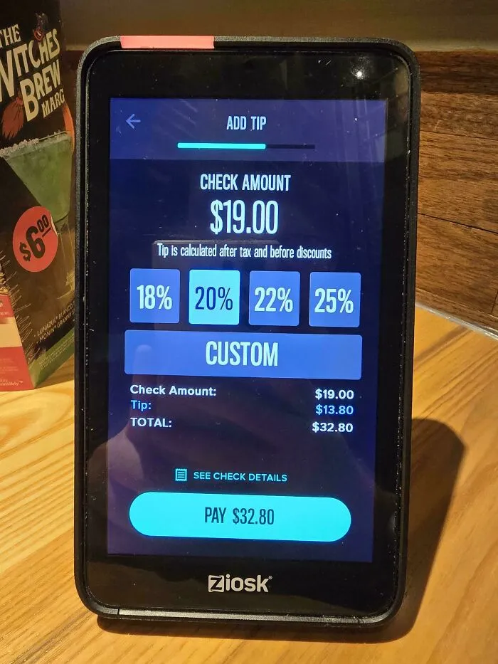 Interactive tipping screen showing a $19 check with tipping options up to 25 percent, highlighting tipping culture issues.