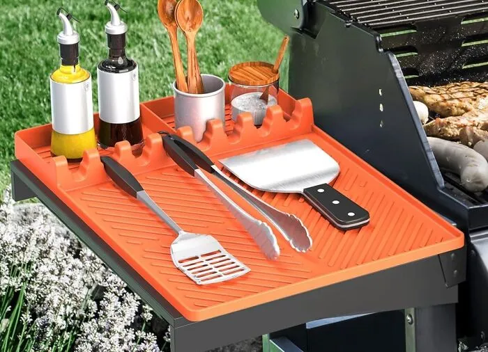 Your Patio Table Is Probably Tired Of Getting Those Unintentional BBQ Sauce Tattoos, So Maybe Introduce It To A <a Style="Display:inline;" Href="Https://Www.amazon.com/Silicone-Compatible-Blackstone-Griddle-Spatula/Dp/B0cxfcs2md?th=1&linkcode=ll1&tag=bphawk-20&linkid=e3eee059e84bdfafb0d0977b6075d252&language=en_us&ref_=as_li_ss_tl" Target="_blank"><span Style="Font: Inherit; Color: #d74b1f;"> Silicone Grill Tool Matt </Span>