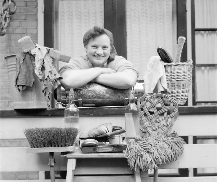 A Housewife Surrounded By Cleaning Utensils, 1952