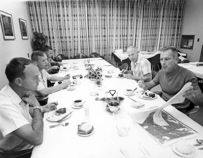 Apollo 11 Astronauts Review Lunar Charts During Breakfast