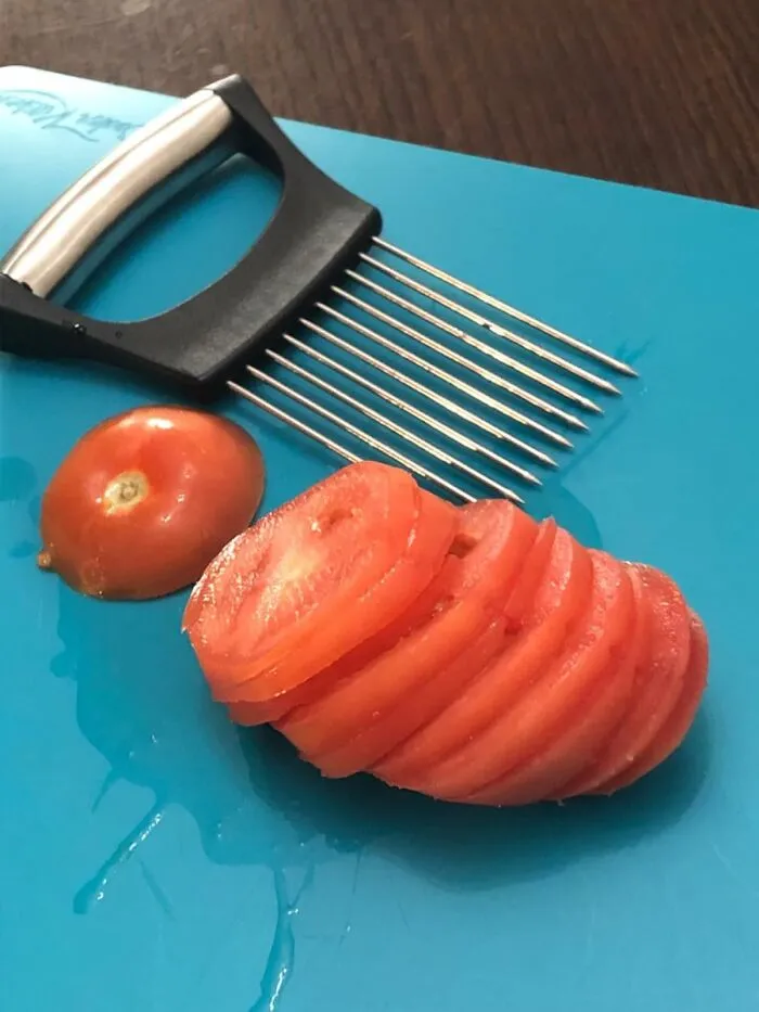 This <a Style="Display:inline;" Href="Https://Www.amazon.com/Jayvar-Onion-Holder-Vegetable-Assistant/Dp/B0c9zgmn9d?ie=utf8&linkcode=ll1&tag=bpbird-20&linkid=18312b8a269ad8fbdb4cad0b4bd19ad6&language=en_us&ref_=as_li_ss_tl" Target="_blank"><span Style="Font: Inherit; Color: #d74b1f;"> Veggie Holder For Slicing </Span> Tells Your Slippery Veggies To 'Get A Grip' So Your Fingers Don't End Up Looking Like They Lost A Fight With A Tiny Wolverine