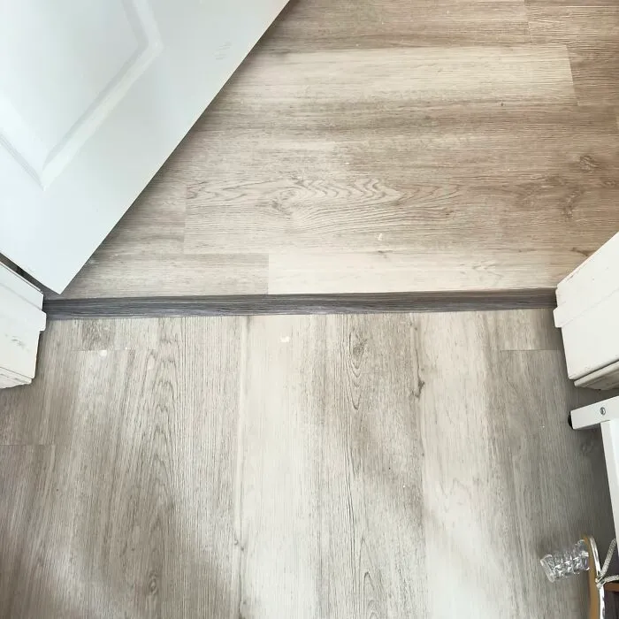 That Awkward Moment Where Two Different Types Of Flooring Meet And Have A Weird Little Argument Can Now Be Elegantly Mediated By This <a Style="Display:inline;" Href="Https://Www.amazon.com/Art3d-Adhesive-Transition-Threshold-Tiles%ef%bc%881-57in/Dp/B0bx3x4vpl?ie=utf8&th=1&linkcode=ll1&tag=bptapir-20&linkid=47023a3d6b934ed2597e5b10abacbc7f&language=en_us&ref_=as_li_ss_tl" Target="_blank"><span Style="Font: Inherit; Color: #d74b1f;"> Vinyl Floor Transition Strip </Span>
