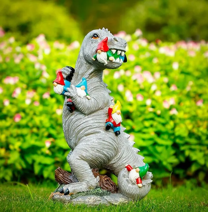 Apparently Your Garden Gnomes Have Finally Had Enough And Decided To Call In Some Prehistoric Backup, Hence The <a Style="Display:inline;" Href="Https://Www.amazon.com/Gp/Product/B097p7wvvr?&linkcode=ll1&tag=bpsnail-20&linkid=725a26b252149484e885d8cd0d943dbd&language=en_us&ref_=as_li_ss_tl" Target="_blank"><span Style="Font: Inherit; Color: #d74b1f;"> T-Rex And Gnome Battle Garden Statue </Span>