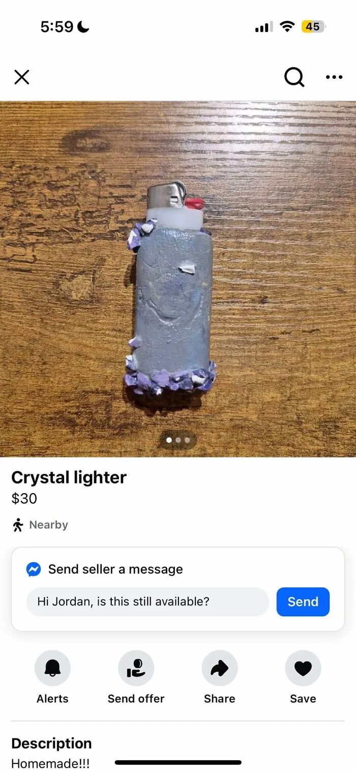 Homemade crystal lighter with uneven purple decoration on wooden surface, example of craft shaming and DIY fail.