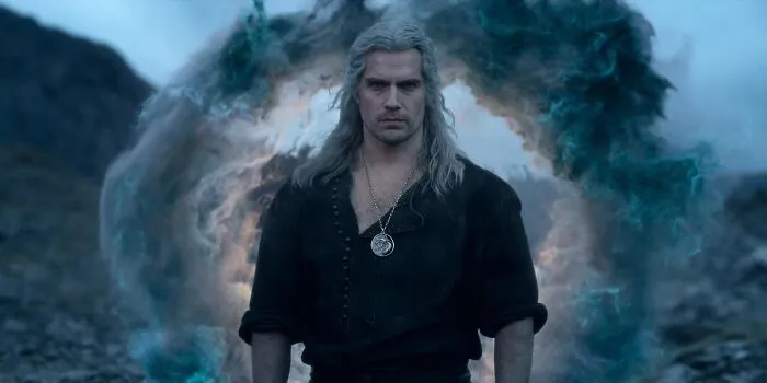 Man with long hair and dark clothing standing in front of a mystical portal, evoking dark, spicy, and heartfelt secrets.