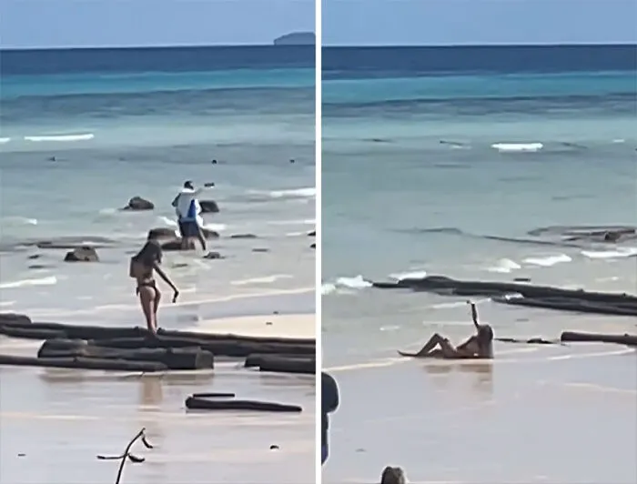 Influencers vergonzosos en la playa ignorando el sentido común y la moral frente al mar azul y arena clara.