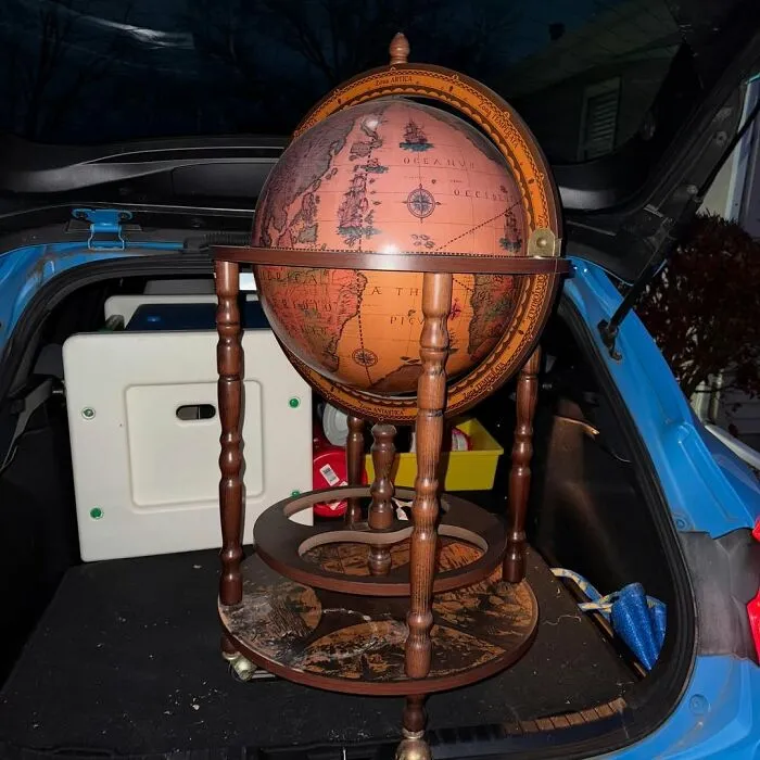 This Is A Beautiful Wooden Globe Drink Cart That’s Made In Italy That We Found Earlier This Year