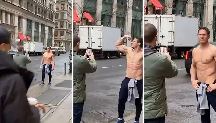 Influencers vergonzosos posando sin camiseta en la calle mientras alguien graba con un móvil en un entorno urbano.