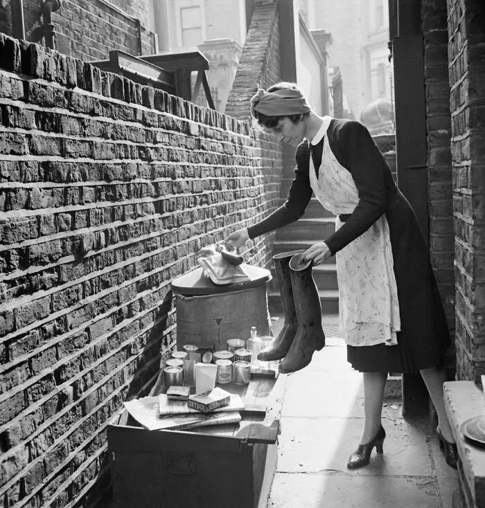 British Housewife Puts Out Items For Salvage During 1942
