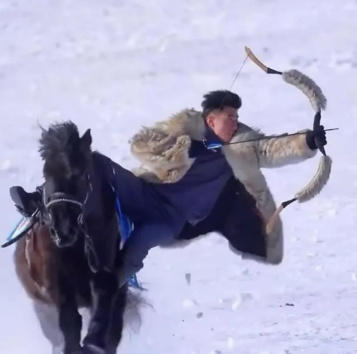 Mongolian Horse Archery Is A Traditional Practice Where Riders Shoot Arrows While Galloping On Horseback