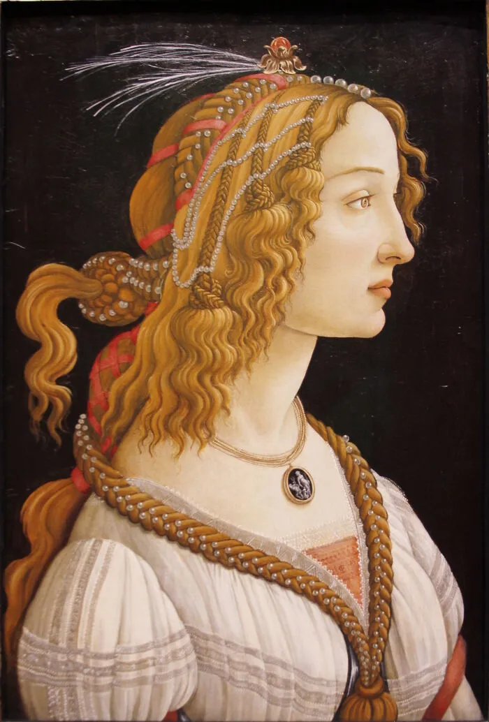 Renaissance portrait of a famous historical figure with elaborate hair and pearl accessories, showcasing good looking features.