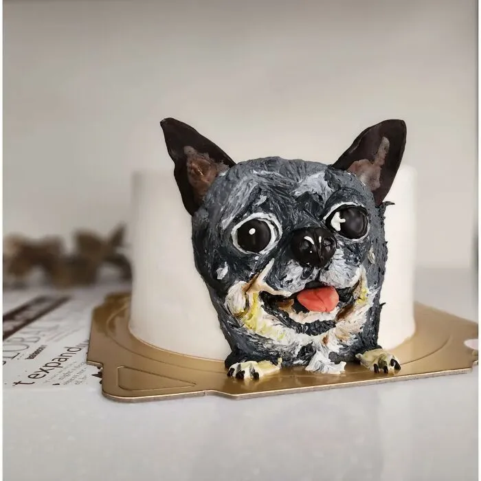 Pet-themed cake featuring a detailed dog face capturing the pet’s unique personality in adorable edible art.