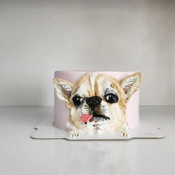 3D pet-themed cake featuring a detailed dog face capturing the unique personality of the adorable pet.