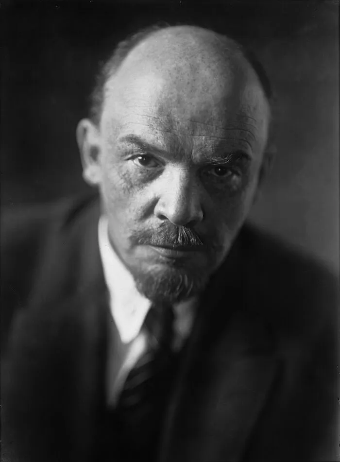 Black and white close-up portrait of a serious man, illustrating historical facts and da Vinci wedding planner themes.