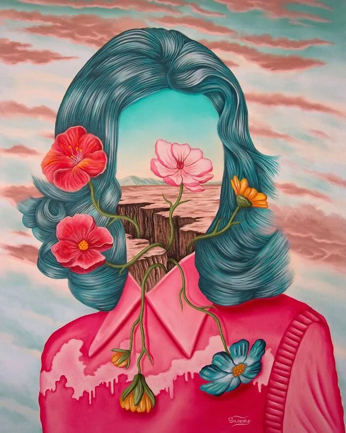 Surreal painting of a faceless figure with blue hair and flowers growing through a split desert landscape background.