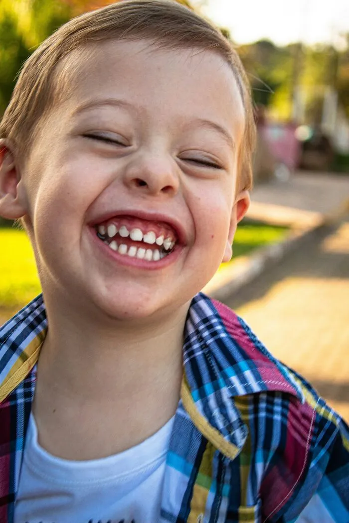 Smiling child outside enjoying a joyful moment, capturing the best I Was There When It Was Written memories.