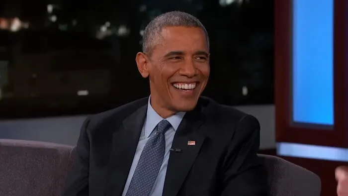 Former U.S. president smiling during a talk show, one of the notable folks from history people admire.
