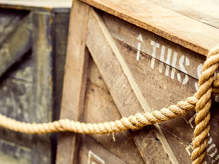Rope tied around old wooden crates, representing strength and concepts to keep the brain active and healthy.