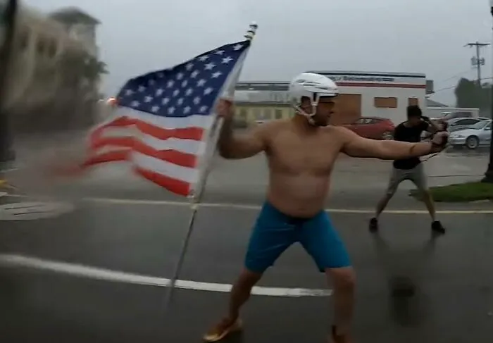 Florida Man Standing In The Streets Right Before The Eye Wall Of Hurricane Ian Hits